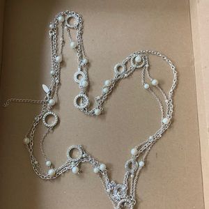 Costume silver, pearl, and crystal trio necklace.